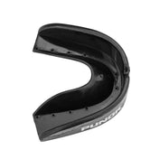 Black mouthguard in profile, showing inner molded bite surface