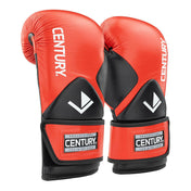 Red kickboxing punch gloves with black panels, V emblem, and Century wrist branding