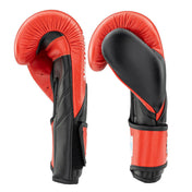 Side view of red and black kickboxing punch gloves with curved knuckle padding