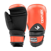 Red and black boxing gloves showing back padding and curved hook-and-loop closure