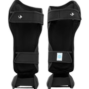 Black shin instep guards with hook-and-loop straps and inner label patch