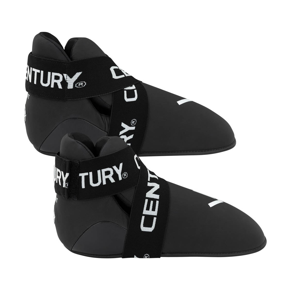 Black slip-on kicks with thick hook-and-loop strap and white logo branding