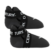 Black slip-on kicks with thick hook-and-loop strap and white logo branding