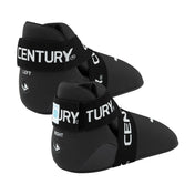 Black slip-on kicks with 'LEFT' and 'RIGHT' markings on the strap and white logos