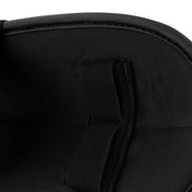 Black fabric upper close-up with stitched seam panel and small pull-tab detail