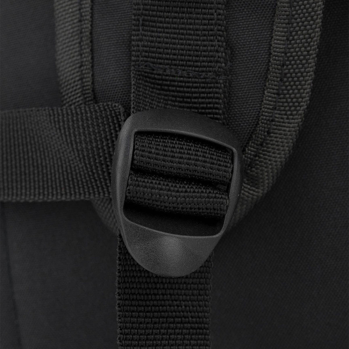 Black backpack shoulder strap with plastic buckle and woven webbing