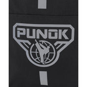 Close-up of black backpack front with large silver PUNK logo and emblem