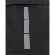 Close-up of black backpack front with vertical light-gray stripe graphic
