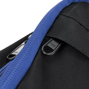 Close-up of blue webbing and black zipper pull on a backpack
