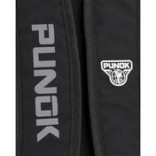 Kumite backpack close-up: vertical PUNOK lettering and round emblem on panel
