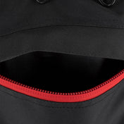 Kumite backpack interior opening with red zipper track and black inner lining