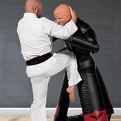 Black protective martial arts jacket with long sleeves and red logo patch