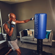 Wavemaster freestanding punch bag with blue cylinder and black base, boxing stance