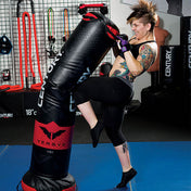 Black Versys VS.1 training bag with red logo, standing with a padded top strap.