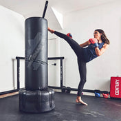 Black two-piece punching target: tall top bag and padded base