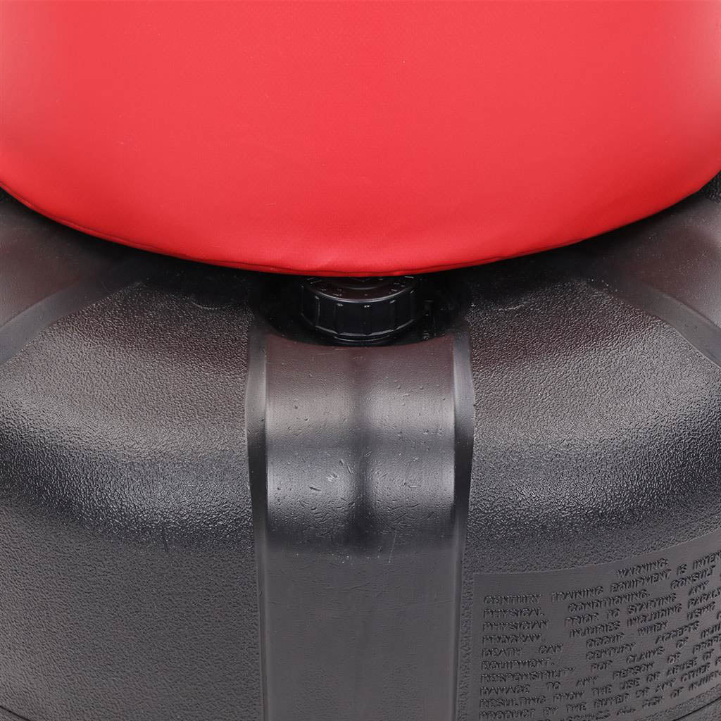 Red inflatable training bag top with black ring base and gray mounting strap