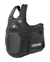 Black belly pad with front logo patch, zippered panel details, and carry handle
