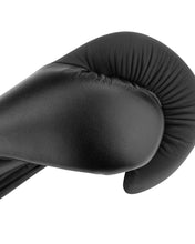 Black boxing glove with padded thumb and curved knuckle