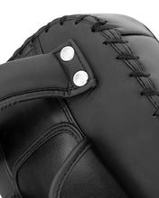 Black leather-look Thai pad, close-up of top strap hardware and stitched lace detail.