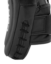 Black focus mitt with textured thumb/hand grip and stitched embroidered logo detail