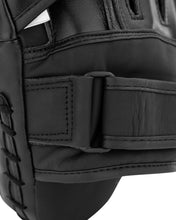 Black boxing focus mitt pair wrist strap with padded velcro panel and stitching