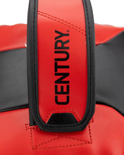 Close-up of red and black Muay Thai pad showing Century logo on wrist strap