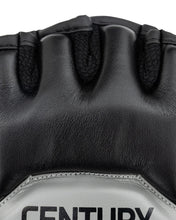 Youth fight gloves close-up: textured black wrist and finger knuckle grips