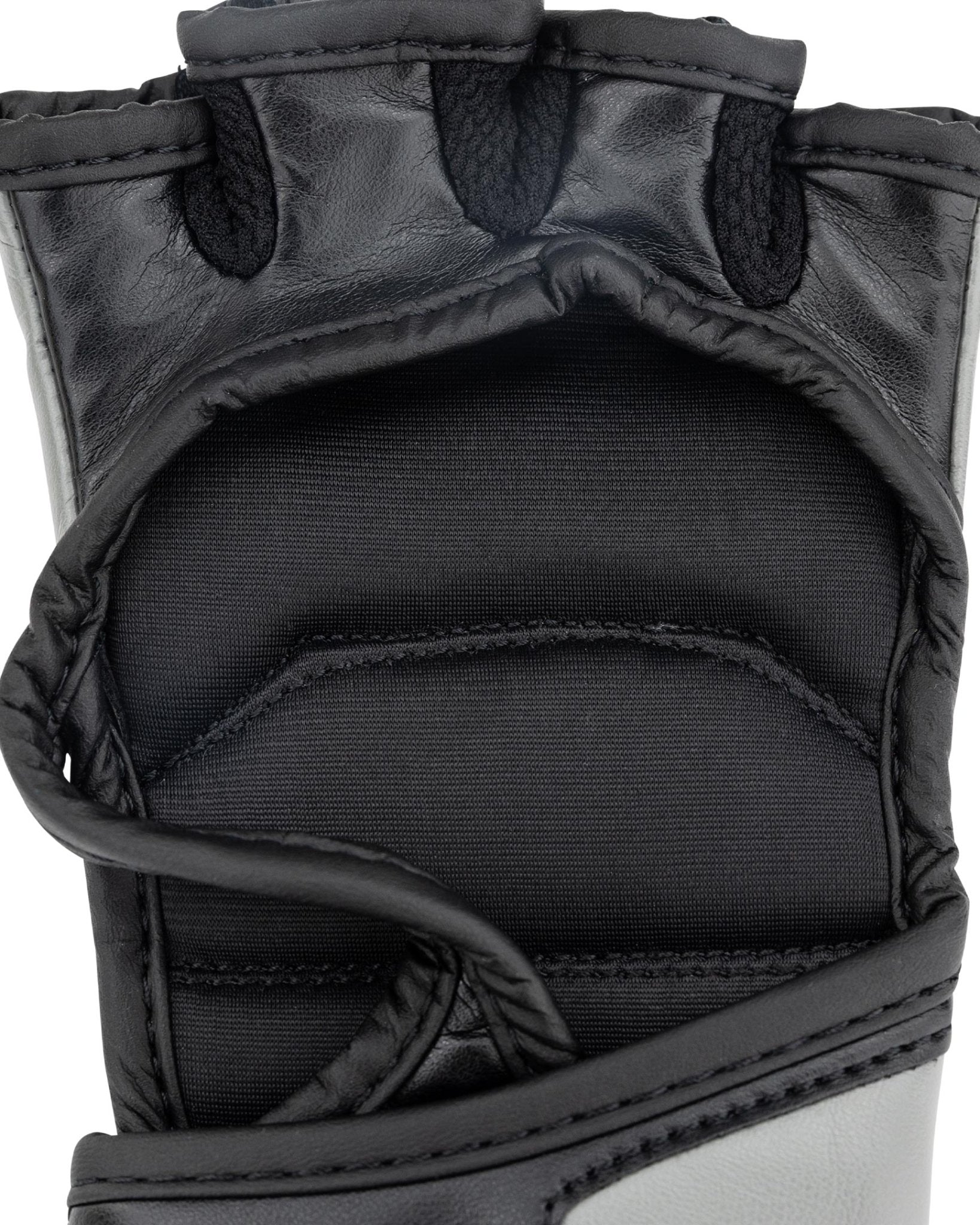 Youth fight gloves in black and dark gray, padded knuckle and wrist close-up
