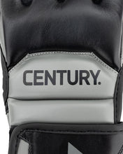 Youth fight gloves close-up: Century logo on light grey center with black padding