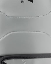 Grey youth heavy bag glove close-up of curved stitching and logo mark