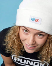 White Punok beanie on model with front logo patch