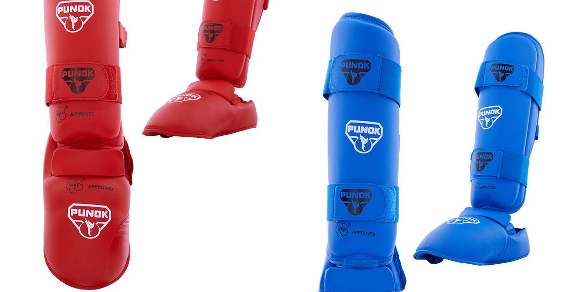 WKF-approved shin and instep guards, red and blue protective pads with straps