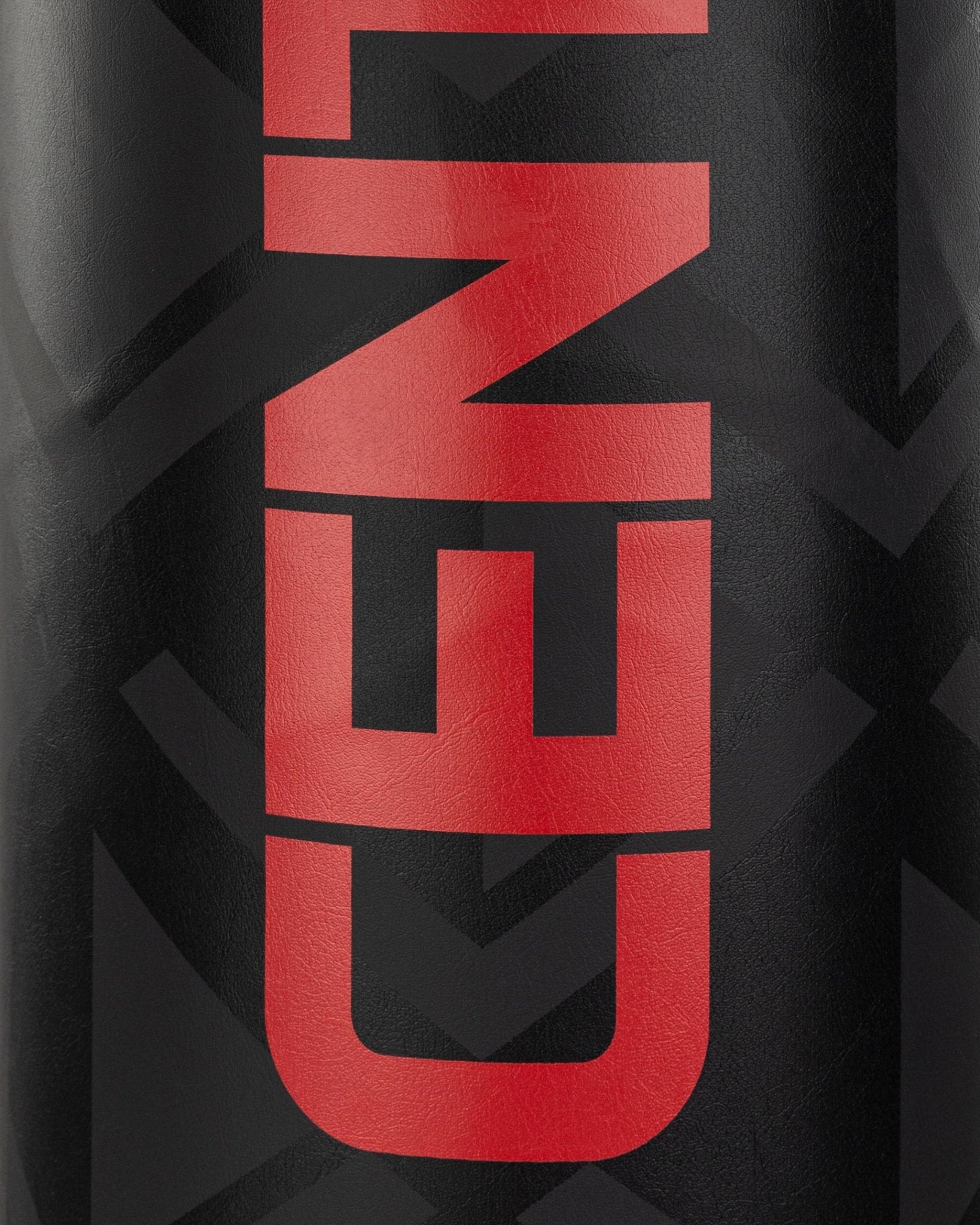VS.1 heavy bag close-up of red U-shaped emblem on black fabric