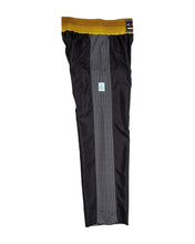 Tenacity pant by WAKO C-Gear, black with yellow waistband and textured vertical panel