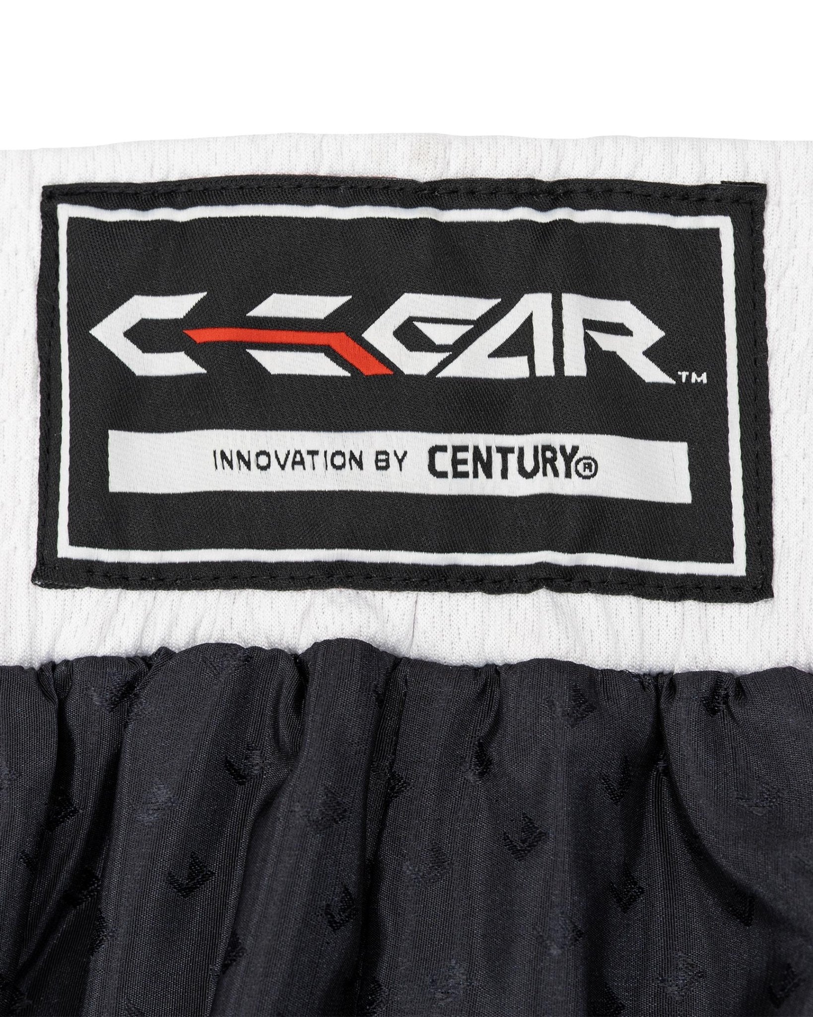 Black and white Tenacity pant with elastic waistband and logo patch