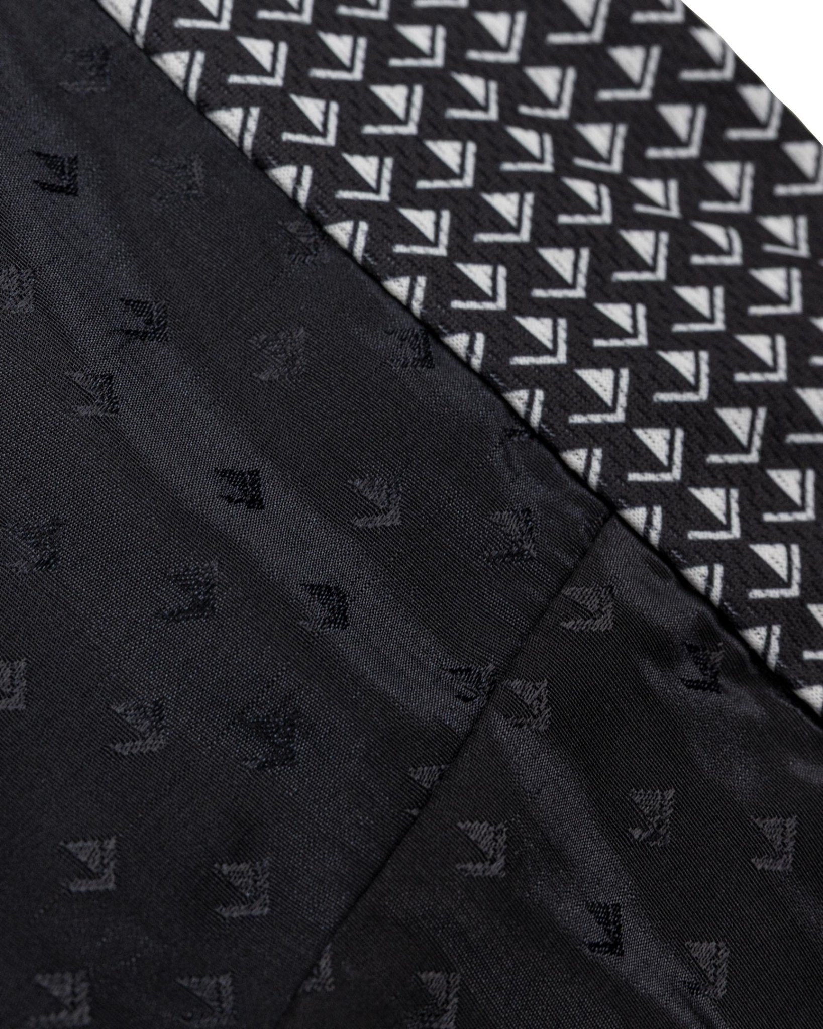 Tenacity pant by WAKO C-Gear, close-up of dark fabric with small repeating pattern