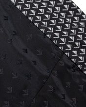 Tenacity pant by WAKO C-Gear, close-up of dark fabric with small repeating pattern