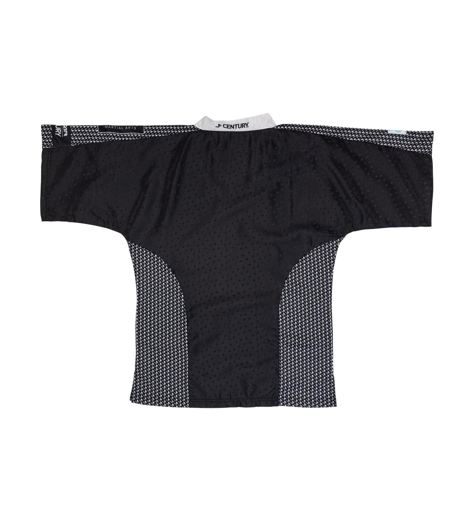 Black martial arts top with white trim around neckline and textured side panels