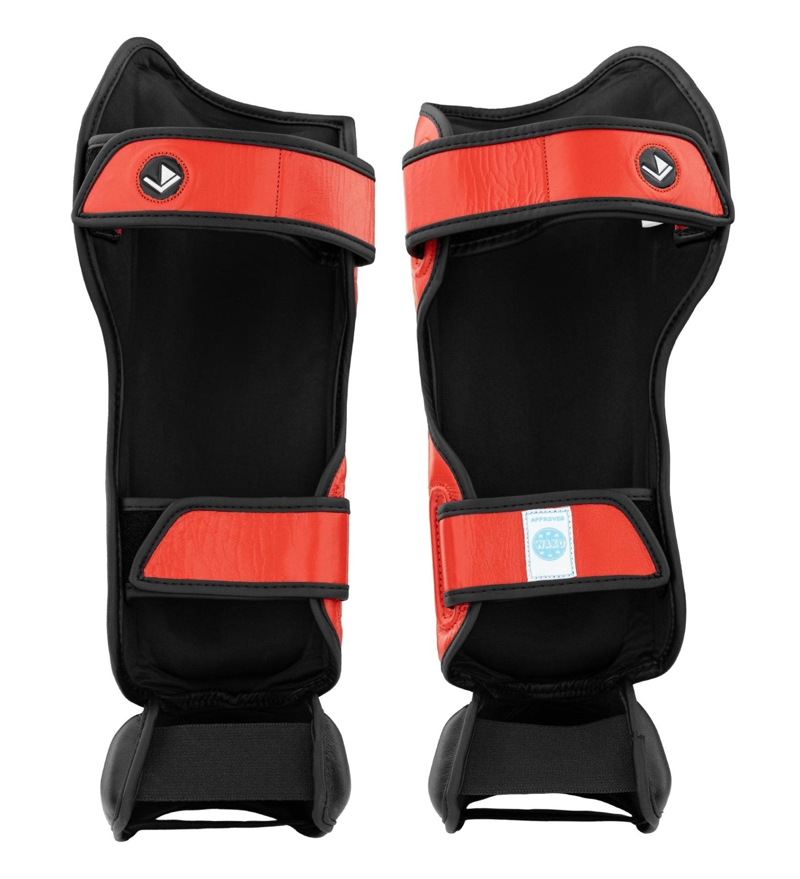 Shin instep guards in black with red trim and hook-and-loop straps