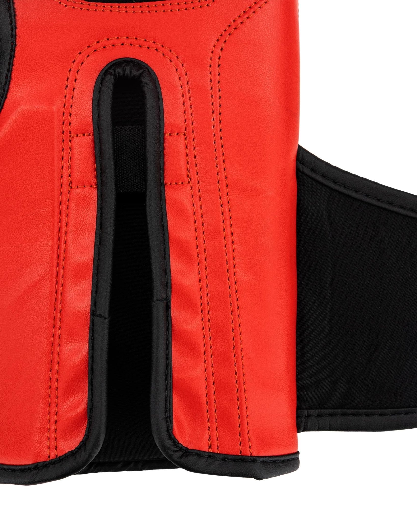 Red kickboxing glove cuff with padded finger sleeve and black strap
