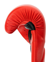 Red kickboxing glove with black thumb area and curved punch pad
