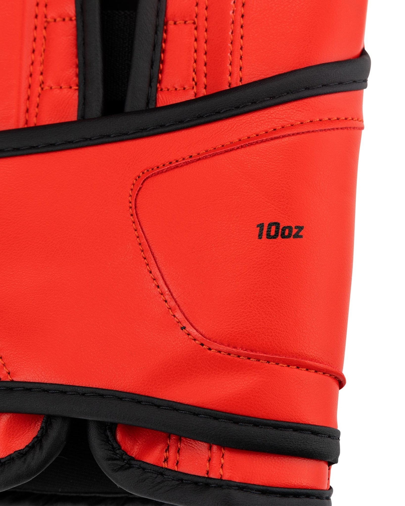 10 oz red kickboxing glove with black wrist strap and stitched panel
