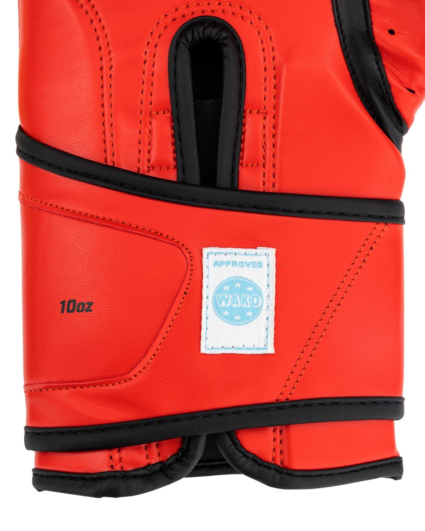 Red 10 oz kickboxing glove with WAKO approved patch and black wrist band