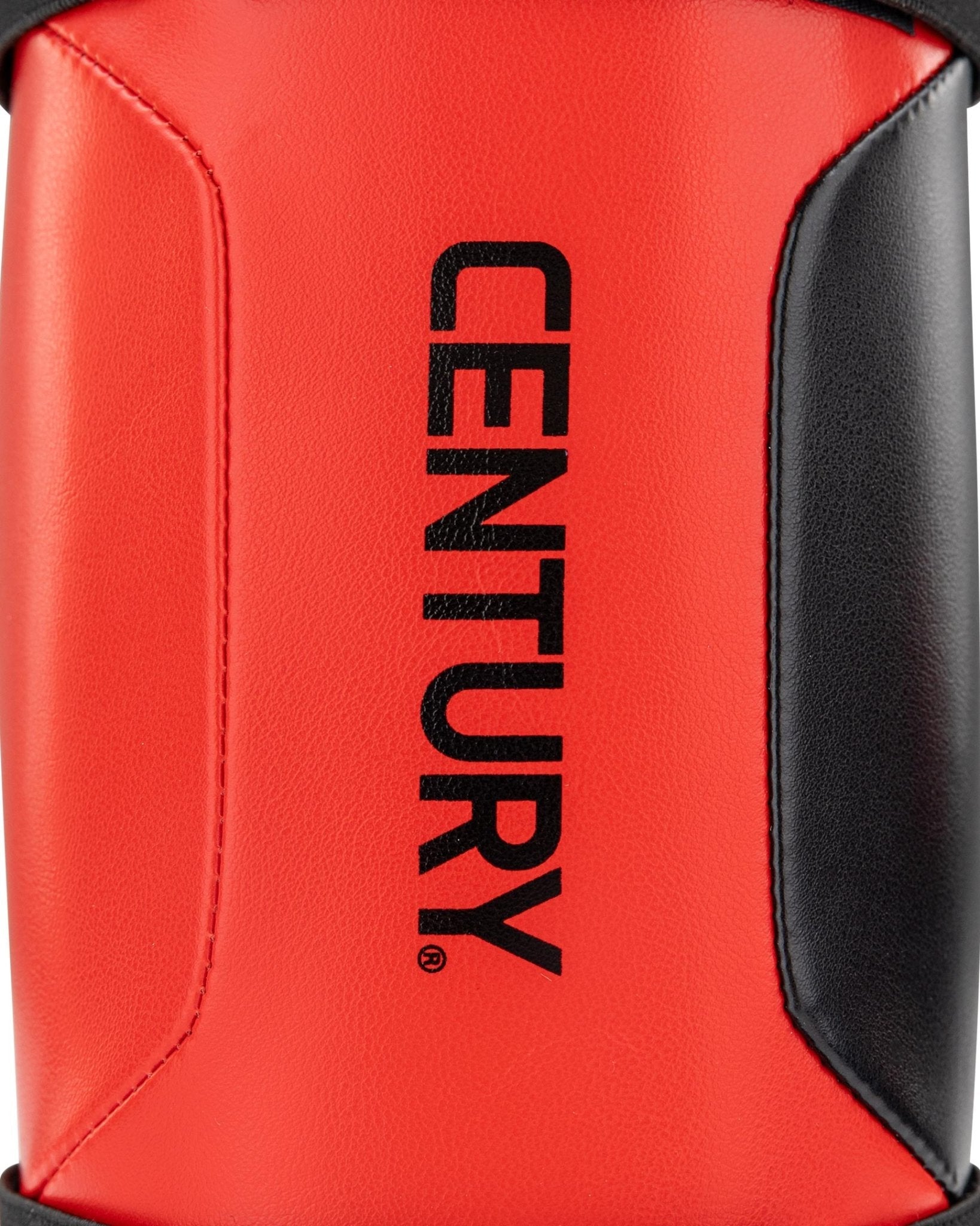 WAKO Drive shin guards in red with black side panels and vertical EN TURY branding.