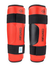 WAKO Drive shin guards (pair) in red with black straps, EN TURY branding, and blue patch.