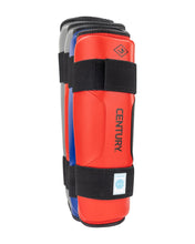 WAKO Drive shin guards in red with black straps, blue accents, and EN TURY text.
