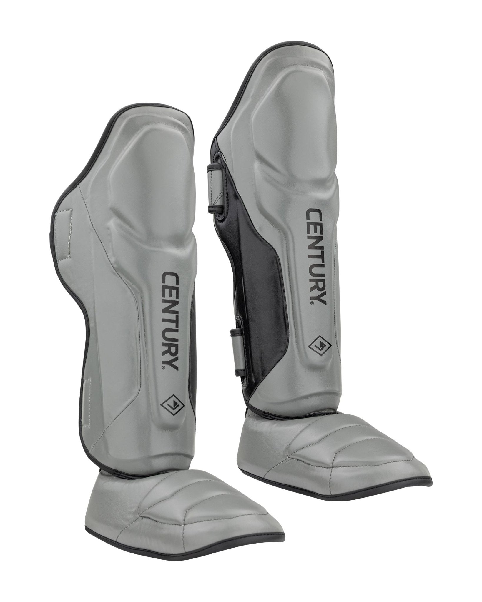 Grey shin instep guards with black side panel, padded toe area, and CENTURY logo.