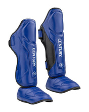 Blue shin instep guards with black side panels and CENTURY logo on guards.