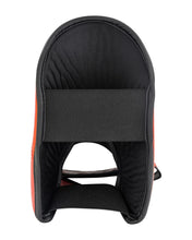 Black shin instep guard opening with orange trim and fabric strap loops.