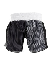 Black kickboxing shorts with white patterned side panel and elastic waistband